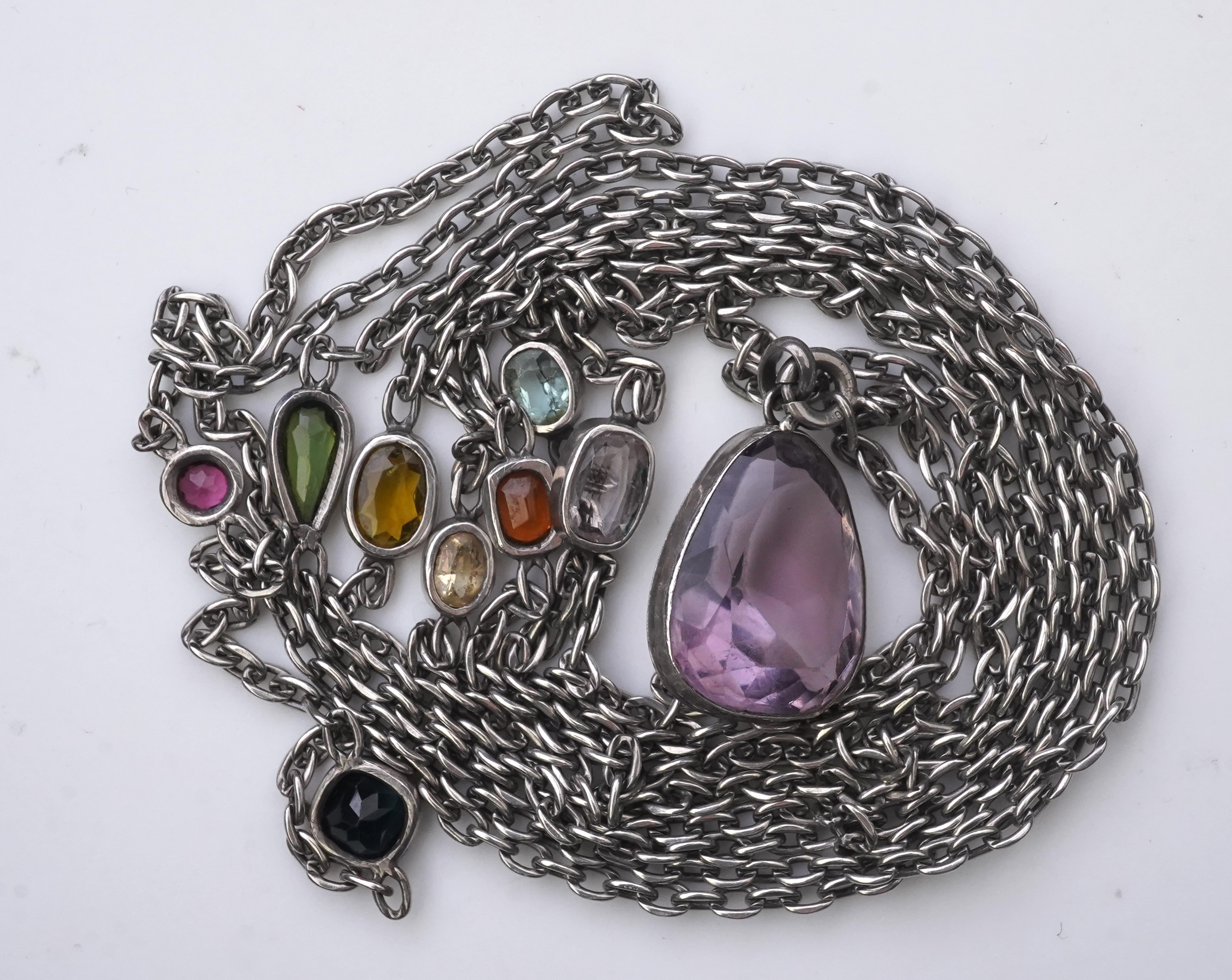 A collection of silver and gem-set jewellery